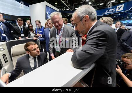 Yann Delabriere, PDG de Zodiac Aeospace , Emmanuel Macron, president de la Republique, visite du salon, stand Zodiac Aerospace52eme Salon international de l'aeronautique et de l'espace. Visite du president de la Republique . Le Bourget, près de Paris, le 19 Juin 2017. Photo by Gilles Rolle/Pool/ABACAPRESS.COM Stock Photo