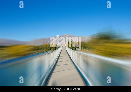 Concrete bridge motion blur in autumn season. Stock Photo