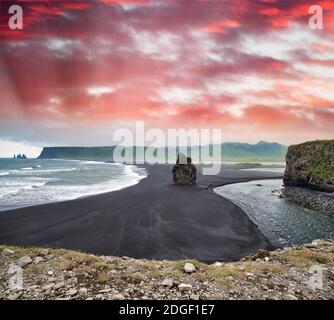 Reynisfjara Black Beach on a cloudy summer morning, Iceland Stock Photo