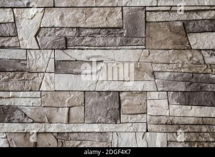A fragment of wall covered with ceramic tiles Stock Photo
