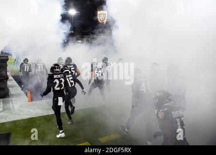 The Dallas Cowboys take the field prior to kickoff at the National