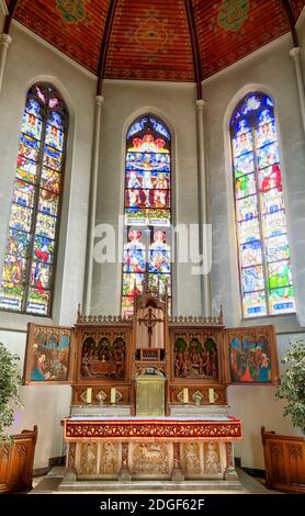 Church Interior with chairs and altar and tabernacle Stock Photo