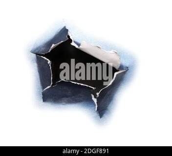 Hole ripped in paper on white Stock Photo