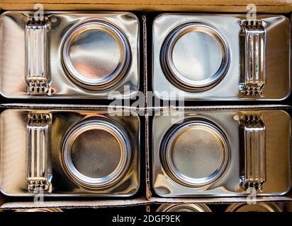 Metal packaging of chemical contents in paper box Stock Photo