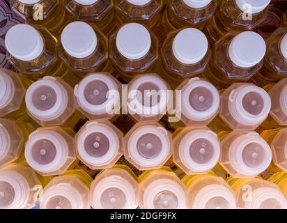Top view of plastic bottles Which contain palm oil for sale Stock Photo