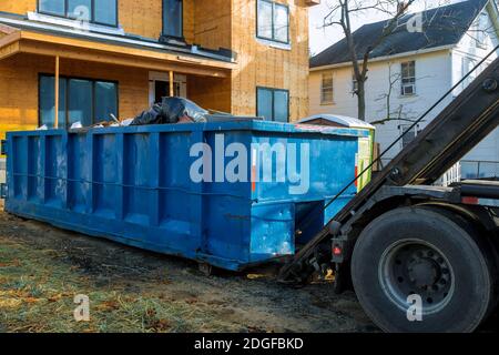 Recycling container trash dumpsters being full with garbage Stock Photo