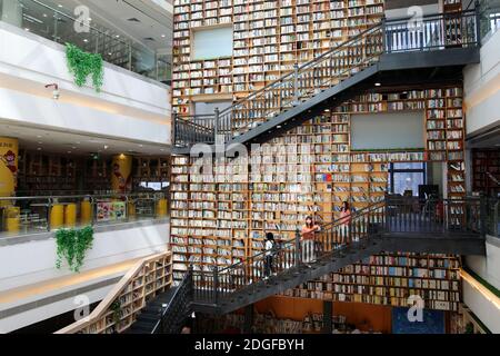 The first library jointly built by Guangzhou and Foshan, READING HOME, covers an area of 1,000-square-meters and features a 16.2-meter-tall giant book Stock Photo