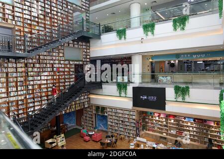 The first library jointly built by Guangzhou and Foshan, READING HOME, covers an area of 1,000-square-meters and features a 16.2-meter-tall giant book Stock Photo