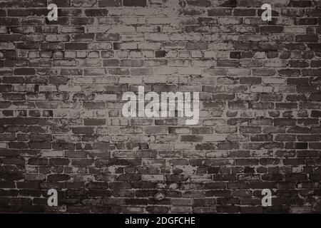 Background image: a fragment of an old stone wall. Stock Photo