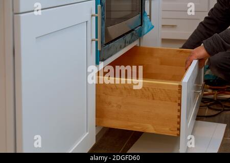 Home improvement kitchen view installed in a new kitchen cabinet Stock Photo