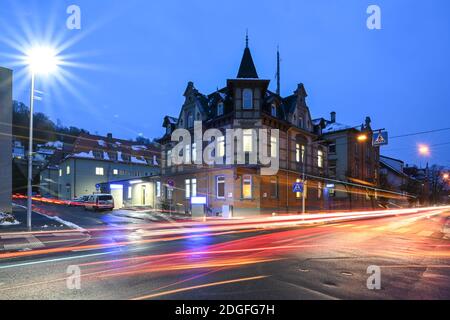 Ravensburg, Germany. 08th Dec, 2020. Cars drive past the police station. For a decade it was considered the 'most dilapidated office building of the Baden-Württemberg police force' - now the Ravensburg police station has been renovated. (shot with long time exposure). Credit: Felix Kästle/dpa/Alamy Live News Stock Photo