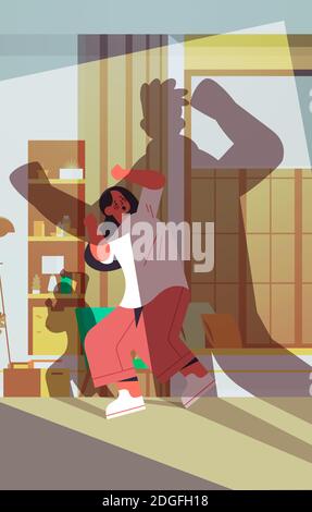 shadow of angry husband punching and hitting wife stop domestic ...