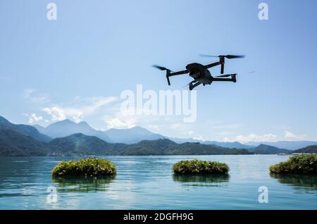 Flying drone on the sky Stock Photo