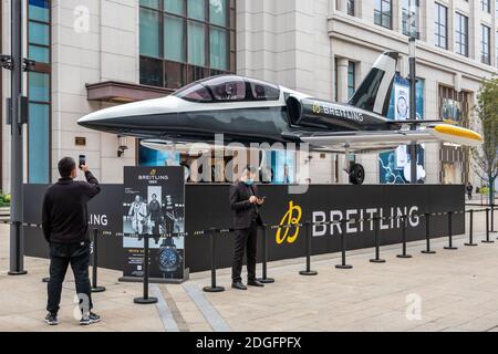 A L-39 Albatros, a high-performance jet trainer developed by Aero Vodochody is exhibited outside a mall during a promotional event of Breitling SA, a Stock Photo