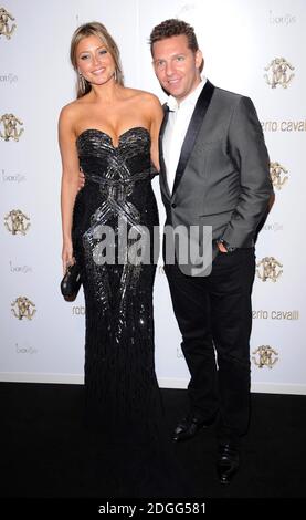 Holly Valance and Nick Candy arriving at the Roberto Cavalli Store Launch After Party, Battersea Power Station, London. Stock Photo