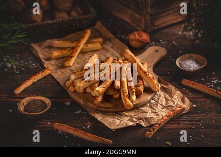 Homemade sticks with cumin seeds. Bread sticks. Still life composition Stock Photo