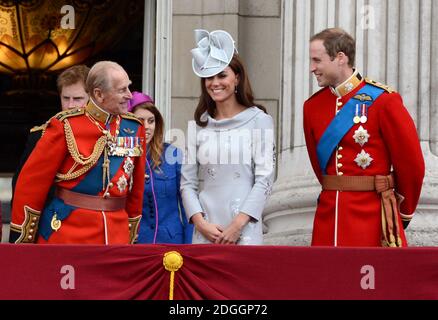 (Left to Right) Prince Harry, Prince Philip Duke of Edinburgh, Princess Eugenie, Catherine Duchess of Cambridge and Prince William Duke of Cambridge watching a Royal Air Force fly pass with their family from the balcony of Buckingham Palace after the Trooping The Colour at the Horse Guards Parade in London Stock Photo