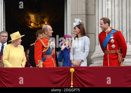 (Left to Right) Prince Andrew, Queen Elizabeth, Prince Harry, Prince Philip Duke of Edinburgh, Princess Eugenie, Catherine Duchess of Cambridge and Prince William Duke of Cambridge watching a Royal Air Force fly pass with their family from the balcony of Buckingham Palace after the Trooping The Colour at the Horse Guards Parade in London Stock Photo