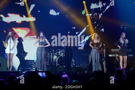 Girls Aloud on stage during the 2012 Capital FM Jingle Bell Ball at the O2 Arena, London. Stock Photo