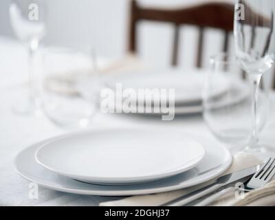 Beautiful table setting in white colors Stock Photo