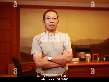 --File--In this unlocated photo, Zhong Shanshan, Chairman of Nongfu Spring Co., Ltd. poses for photos in China, 25 August 2008. Stock Photo