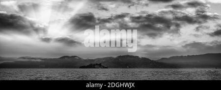 Panoramic view of Alcatraz Island and San Francisco coastline dat sunset, California, USA Stock Photo