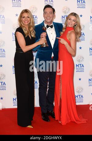 Tess Daly, Craig Revel Horwood and Abbey Clancy backstage at the National Television Awards 2014, O2 Arena, Greenwich, London. Stock Photo