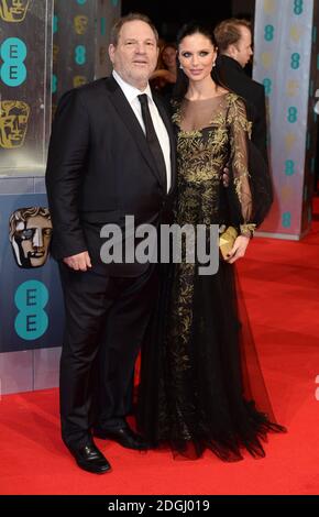Harvey Weinstein and Georgina Chapman arriving at The EE British Academy Film Awards 2014, at the Royal Opera House, Bow Street, London.   Stock Photo