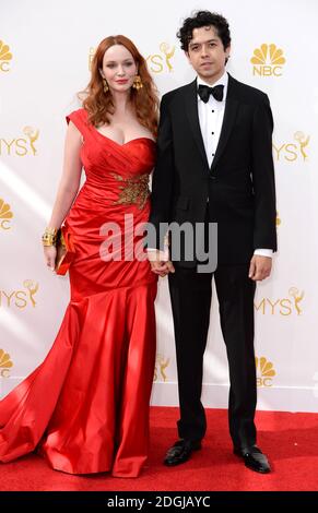 Christina Hendricks and husband Geoffrey Arend arriving at the EMMY Awards 2014, Nokia Live, Los Angeles.  Stock Photo