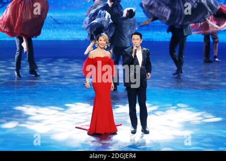 Hong Kong-born American singer-songwriter, record producer, dancer, and actress Coco Lee, left, and Taiwanese singer and actor Jeff Chang sing at the Stock Photo