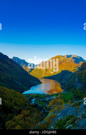 View over the beautiful Norwegian Geiranger fjord in autumn colors. Stock Photo