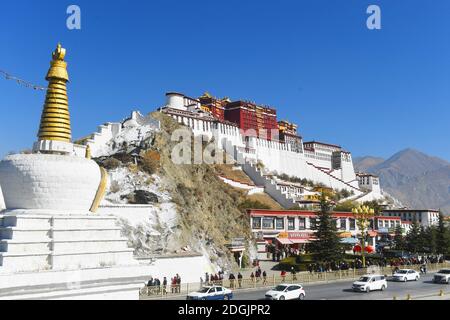The view of the Potala Palace stands upon a hill in the sunshine in winter, Lhasa city, southwest China¯s Tibet Autonomous Region, 18 November 2020. * Stock Photo