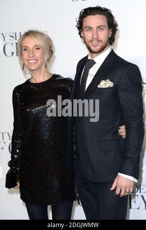 Sam Taylor-Johnson (left) and Aaron Taylor-Johnson (right) attending the UK film premiere of Fifty Shades Of Grey held at the Odeon cinema in Leicester Square, London Stock Photo