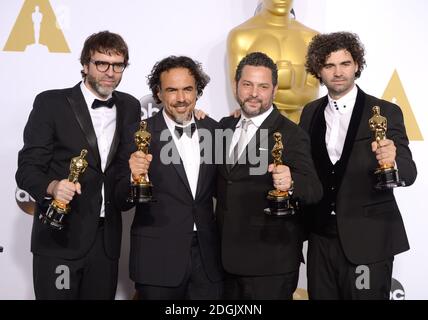 (left to right) Producer James W. Skotchdopole, actor Sean Penn, producer/director Alejandro G. Inarritu, winner of Best Original Screenplay, Best Director, and Best Motion Picture, for 'Birdman' and producer John Lesher, in the press room of the 87th Academy Awards held at the Dolby Theatre in Hollywood, Los Angeles, CA, USA, February 22, 2015. Stock Photo