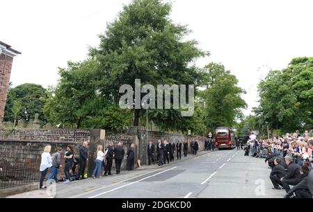 Guests arrive at the Funeral of Cilla Black, St Marys Church, Liverpool. Photo credit should read: Doug Peters EMPICS Entertainment  Stock Photo