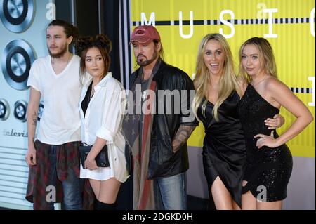 Billy Ray Cyrus and Tish Cyrus arrives at the 61st Annual Grammy Awards
