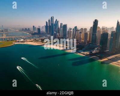 Aerial view of JBR beach and Dubai Marina skyscrapers and luxury buildings in one of the United Arab Emirates travel spots and resorts in Dubai Stock Photo