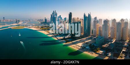 Panoramic aerial view of JBR beach and Dubai Marina skyscrapers and luxury buildings in one of the United Arab Emirates travel spots and resorts in Du Stock Photo