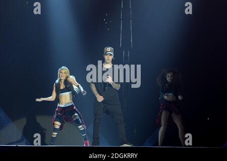Justin Bieber performs on stage during the Capital FM Jingle Bell Ball 2015 held at The O2 Arena, London Stock Photo