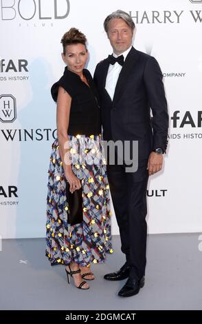 Mads Mikkelsen and Hanne Jacobsen attending the amfAR Cinema Against Aids Gala, held at the Hotel Du Cap, Antibes. Part of the 69th Cannes Film Festival in France. (Mandatory credit: Doug Peters/EMPICS Entertainment)  