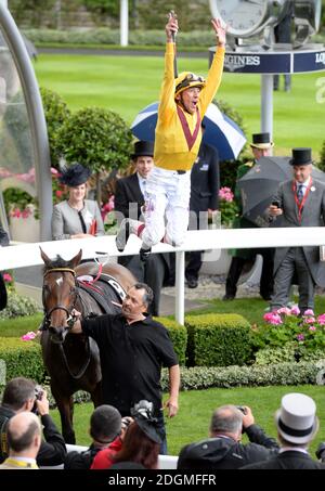 Jockey Frankie Dettori celebrates after winning the Queen Mary Stakes on Lady Aurelia during day two of Royal Ascot 2016, at Ascot Racecourse. Stock Photo