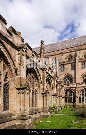 The cloisters as seen from the gardens, Worcester Cathedral, Worcester, UK; earliest parts of the building date from the 11th century. Stock Photo
