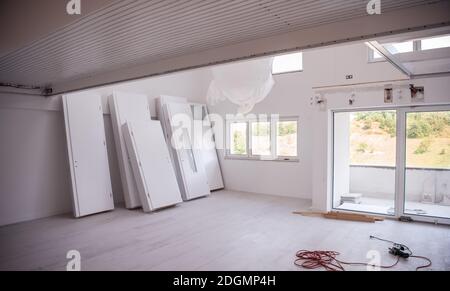 Interior doors stacked in a new apartment Stock Photo