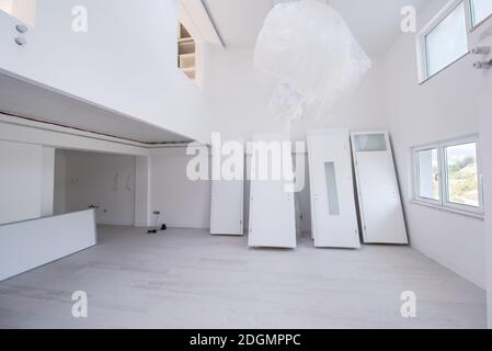 Interior doors stacked in a new apartment Stock Photo