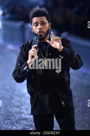 The Weeknd performing live on the catwalk during the Victoria's Secret Fashion Show 2016 held at The Grand Palais, Paris, France.  Photo credit should read: Doug Peters/EMPICS Entertainment. Stock Photo