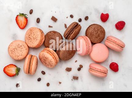 French macarons on white marble, top view Stock Photo