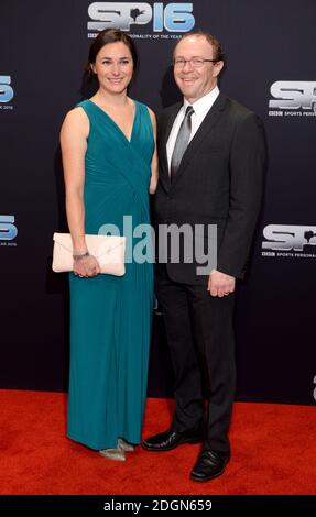 Dame Sarah Storey and Barney Storey during the red carpet arrivals for BBC Sports Personality of the Year 2016 at The Vox at Resorts World Birmingham. Photo credit should read: Doug Peters/EMPICS Entertainment Stock Photo