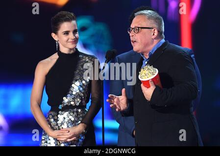 Emma Watson and director Bill Condon accept Movie of the Year for 'Beauty and the Beast' at the 2017 MTV Movie and TV Awards, the Shrine Auditorium, Los Angeles. Photo Credit should read: Doug Peters/EMPICS Entertainment. Stock Photo