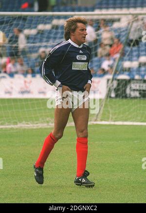 Rod Stewart at The Music Industry Soccer Six Charity Football Competition,  held at Chelsea FC's Stamford Bridge ground, London. Full Length. football  kit Stock Photo - Alamy