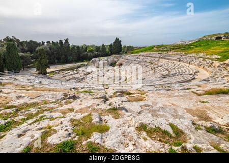 View to auditorium of the ancient Greek theatre (Teatro Greco) in Syracuse. Sicily, Italy Stock Photo